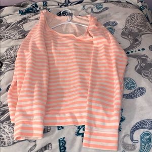 A light peach and white stripped sweater